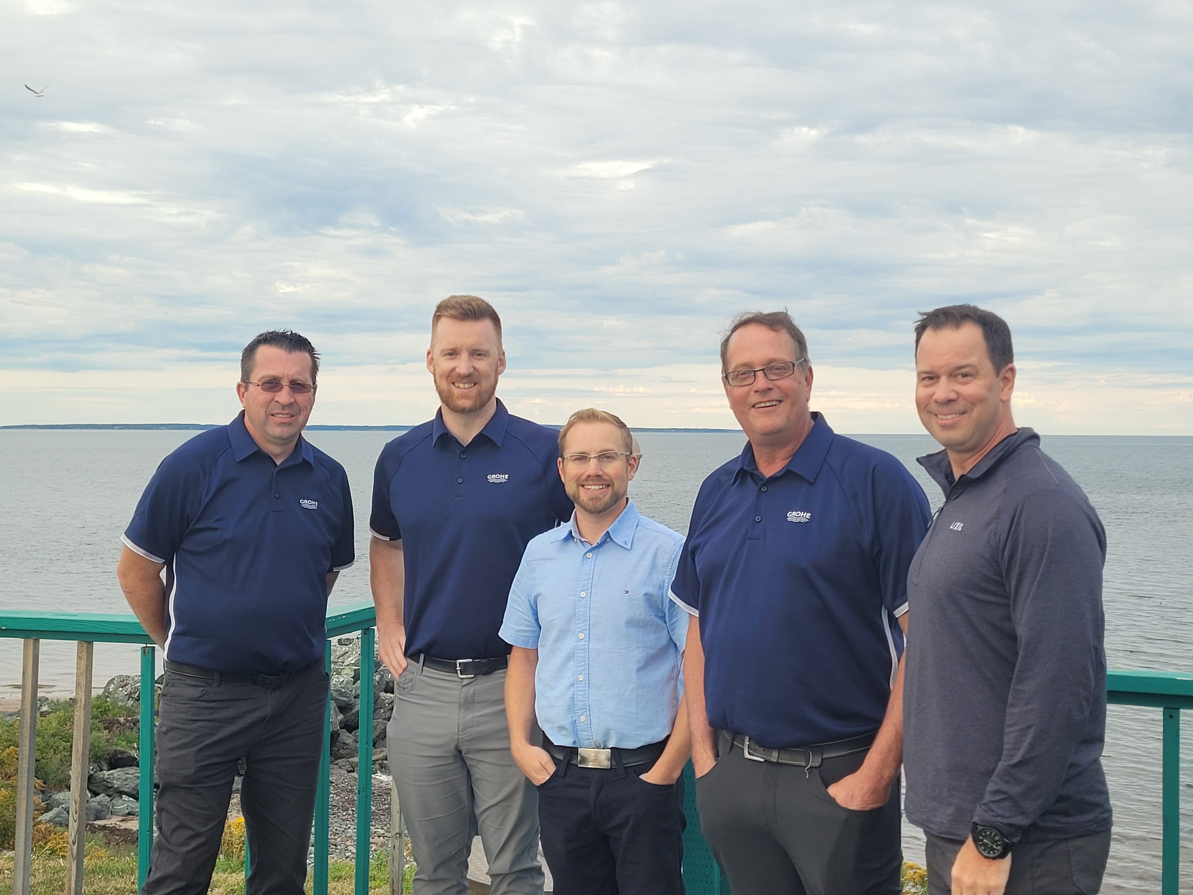 JF Taylor Staff posing in front of camera
